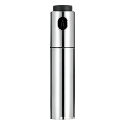 Metallic cylindrical device with a black top on a white background
