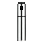 Metallic cylindrical device with a black top on a white background | Cocktail Ceremony
