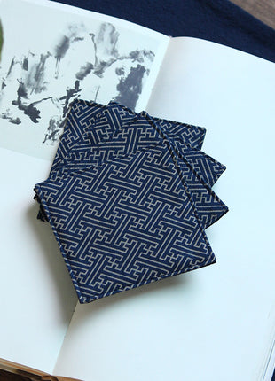 Fabric Coaster — Dark blue base with floral window patterns (9×9 cm)