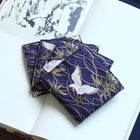 Fabric Coaster — Blue background crane (9×9 cm)