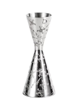 A stainless steel jigger with a skull engraving and a narrow waist design, without a connecting ring.