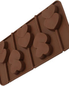 Brown silicone mold with heart shapes on a white background
