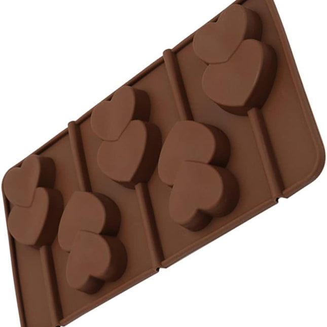 Brown silicone mold with heart shapes on a white background