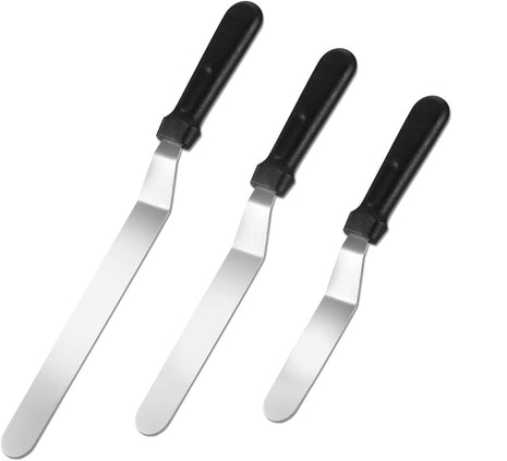 Set of four metal spatulas with black handles on a white background | Cocktail Ceremony