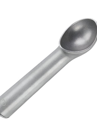 Metallic ice cream scoop on a light gray background