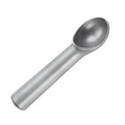 Metallic ice cream scoop on a light gray background | Cocktail Ceremony
