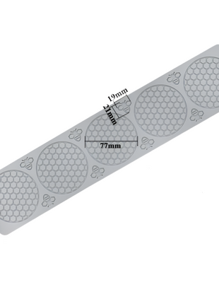 Gray textured mat with measurements on a white background