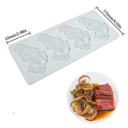 Silicone mold with mushroom shapes and dimensions, shown with a dish of food.
