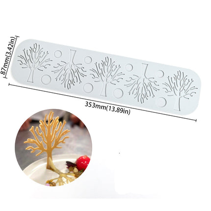 Decorative mold with tree designs and measurements on a white background