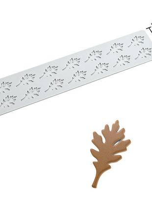 Leaf-shaped mold with dimensions and sample leaves on a white background