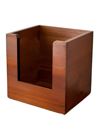 Wooden pen holder with dimensions on a wooden surface