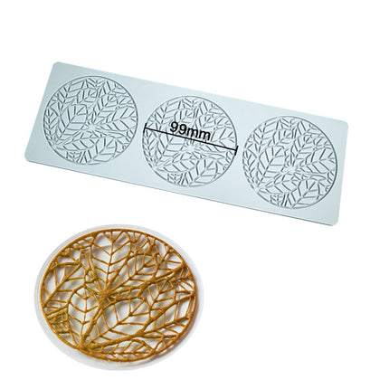 Decorative mold with leaf pattern and measurements on a white background