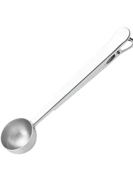 Metal measuring spoon on a white background