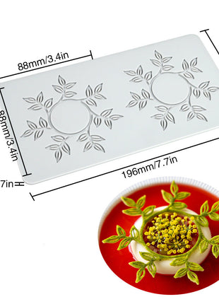 Silicone mold with floral design and measurements, used for making decorative items.