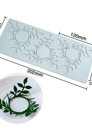 Decorative mold with leaf design, dimensions, and weight displayed on a white background.