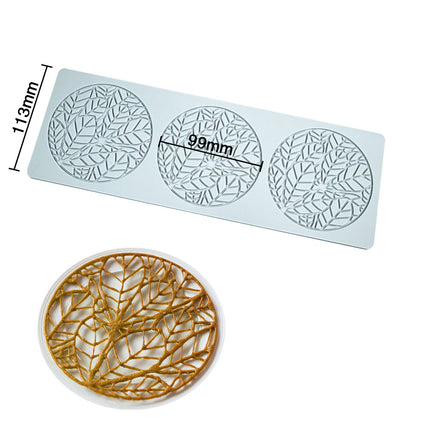 Decorative mold with leaf pattern and measurements on a white background