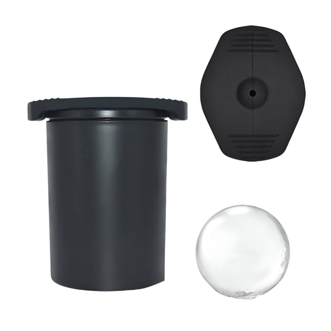 Black cylindrical container with lid, clear sphere, and black circular component on a white background