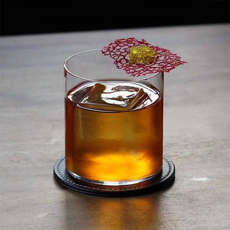 Rocks glass Tumbler — served with a large ice cube | Cocktail Ceremony