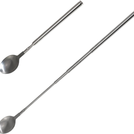 Two metal spoons on a white background