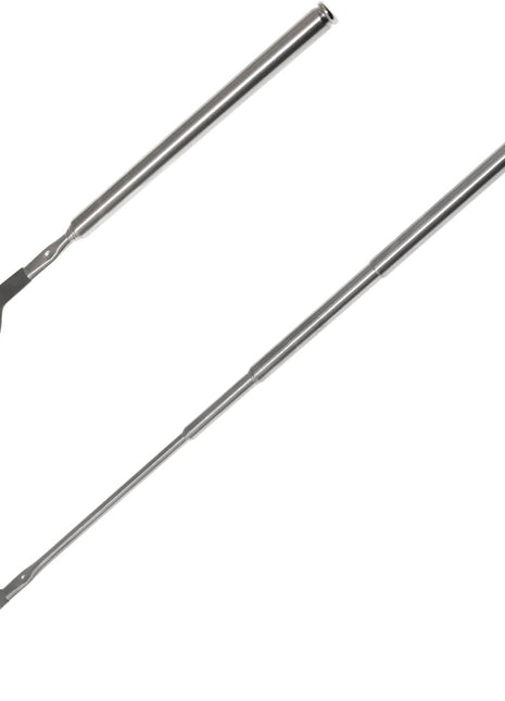 Two metal spoons on a white background